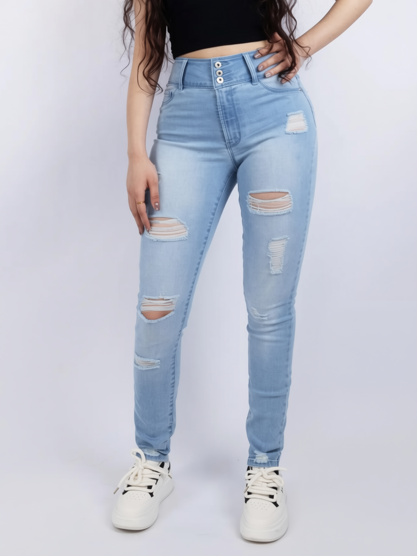 Light wash distressed skinny jeans — front view — Paola Riboni